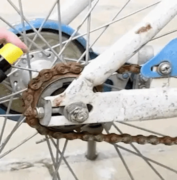 Rust remover used on a bicycle chain and sprocket